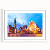 Textured abstract art print of a European scenery in muted earth tones, framed with a white mat, suitable for bedroom decor.