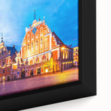 Extra large framed canvas featuring a textured depiction of a European scenery in black with colorful art accents.