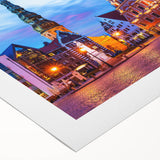 Art deco poster of a European cityscape in muted earth tones on rolled canvas, ideal for dining room wall art.