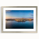 Extra large abstract art print of a textured European scenery in muted earth tones, framed in silver.