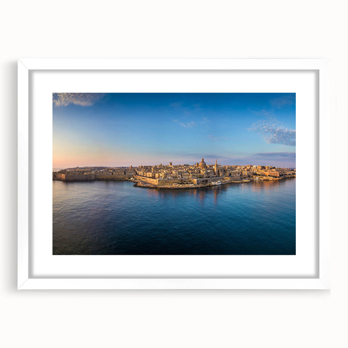 Textured abstract print of Malta scenery in muted earth tones, framed with a white mat, suitable for bedroom art.