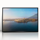 Large abstract wall art depicting a European Malta scenery in muted earth tones, framed in black acrylic.