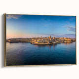 Framed canvas wall art featuring a vintage-style landscape painting of Malta in black and gold tones.