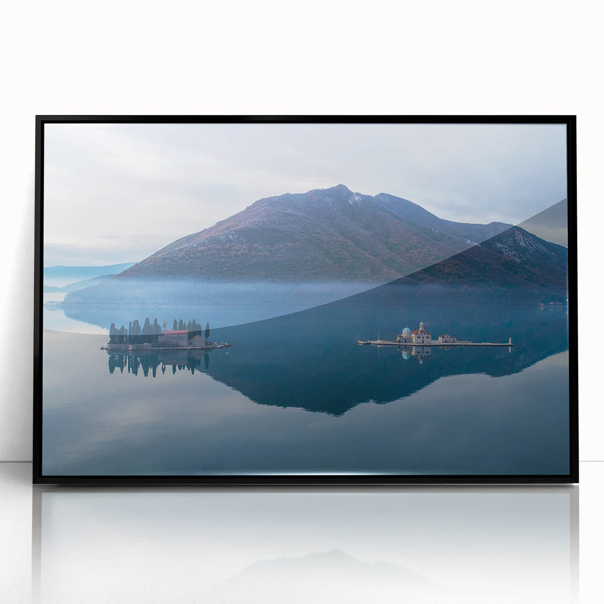 Large abstract wall art featuring a stylized Montenegro scenery in muted earth tones, framed in black acrylic.