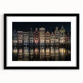 Colorful abstract art print of Amsterdam scenery in vibrant hues on a large framed canvas, ideal for living room decor.