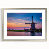 Extra large abstract art print depicting a textured European scenery in muted earth tones, framed in silver.