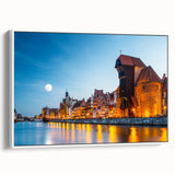 Vintage poster art of a European cityscape in colorful hues on a large framed canvas, ideal for living room decor.