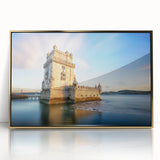 Framed acrylic print of Lisbon's cityscape in art deco style, featuring gold and teal tones.