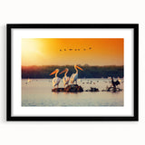 Abstract art print of a colorful European landscape, textured acrylic on a large black-framed canvas.