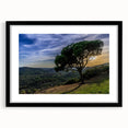 Colorful abstract art print of Andalucia scenery in vibrant hues on textured canvas, framed in black.