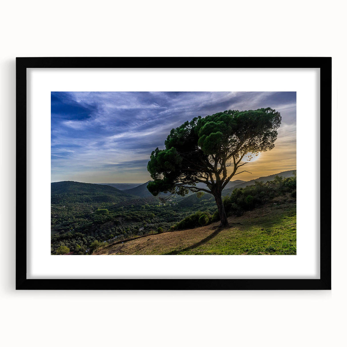 Colorful abstract art print of Andalucia scenery in vibrant hues on textured canvas, framed in black.