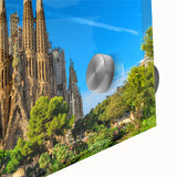 Large abstract depiction of Barcelona skyline in muted blue and gray on acrylic glass, ideal for dining room art.