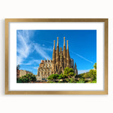 Abstract art print of Barcelona scenery in gold frame, featuring muted earth tones, ideal for dining room decor.
