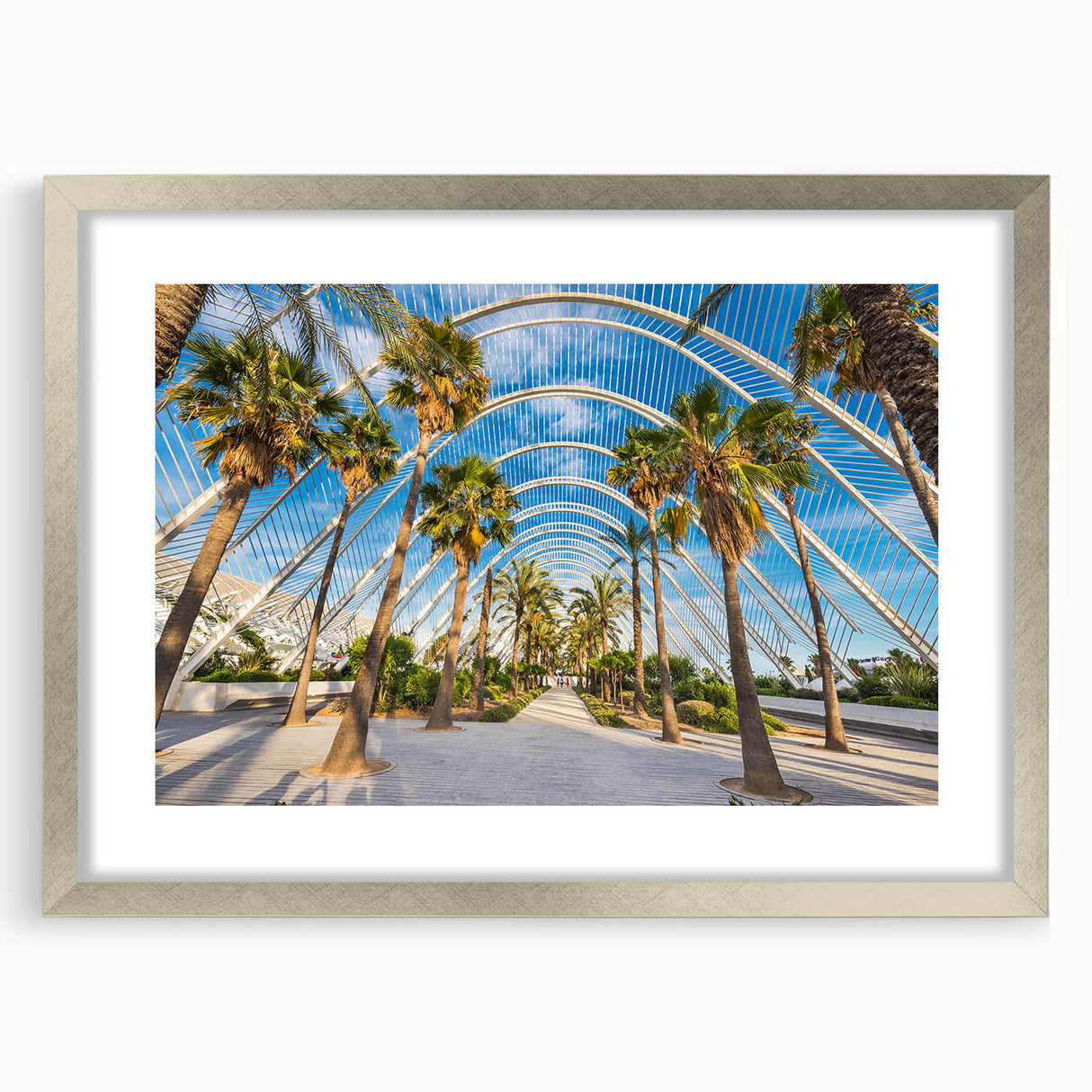 Textured abstract art print of Valencia scenery in muted earth tones, framed in silver, ideal for bedroom decor.