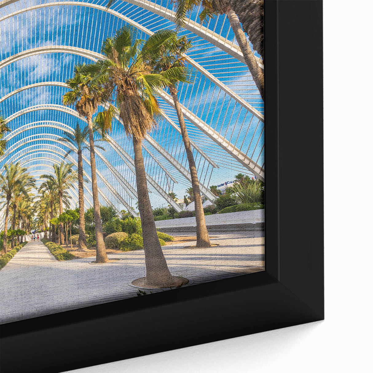 Black wall art depicting a textured view of Valencia with vibrant, colorful accents on a framed canvas.