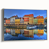 Landscape art painting of Stockholm features vibrant blue and yellow hues on a framed canvas, ideal for living room decor.