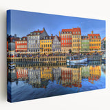 Side view of a stretched canvas featuring a serene Stockholm cityscape in muted blue and gray tones.