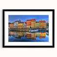 Extra large abstract art print of Stockholm's colorful, textured skyline on a black framed canvas.