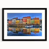 Extra large abstract art print of Stockholm's colorful, textured skyline on a black framed canvas.