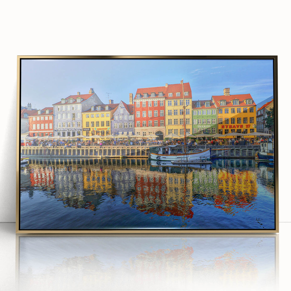 Large art print of Stockholm's skyline in muted gold and blue tones on framed acrylic, ideal for modern nursery decor.