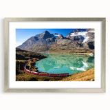 Textured art depicting abstract Swiss scenery in muted earth tones on a framed silver mat, suitable for bedroom decor.