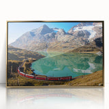 Large art print of a serene Swiss landscape in muted green and blue tones, framed in gold acrylic.