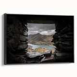 Black and white wall art featuring a vintage poster art style landscape of Wales on a framed canvas, ideal for bedroom decor.