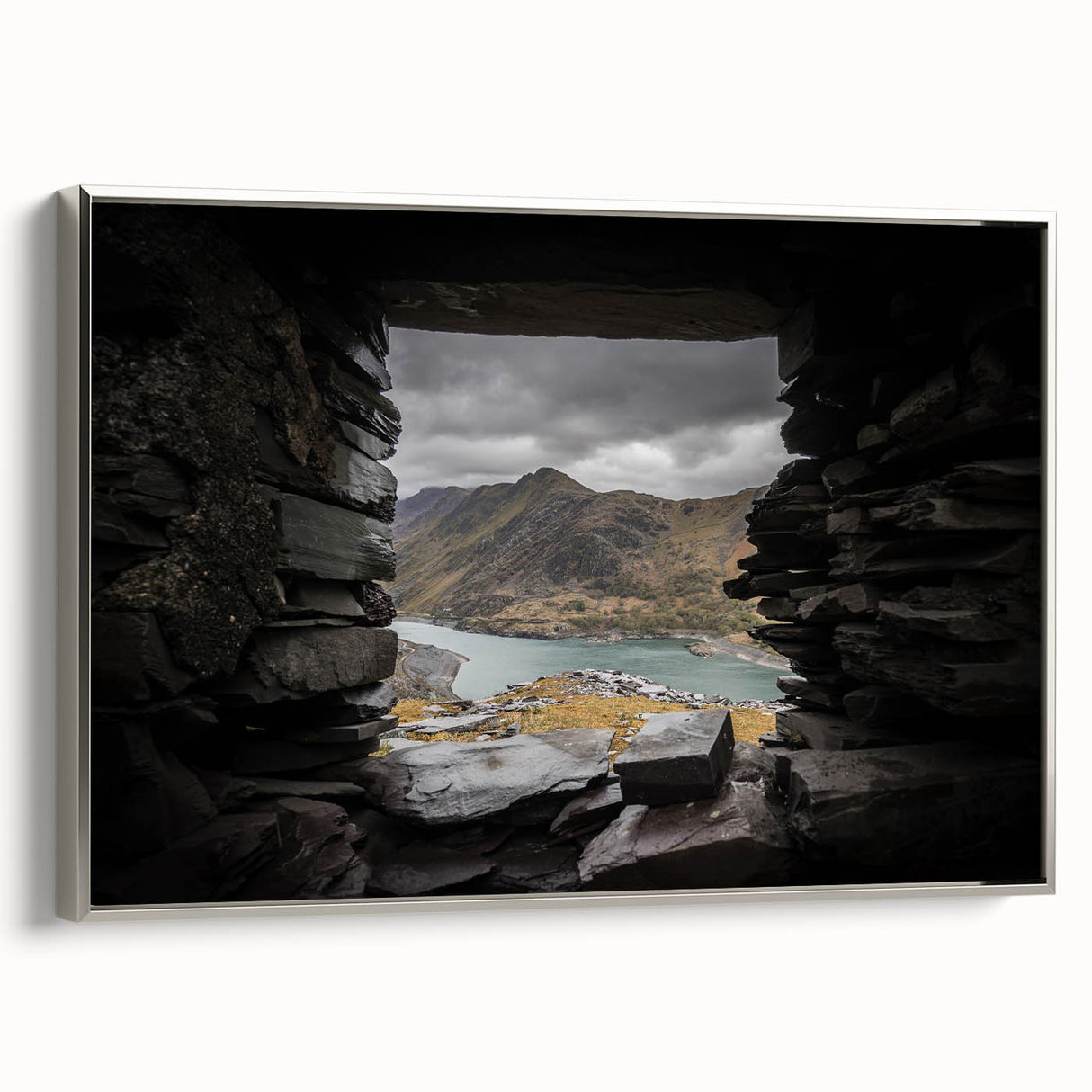 Framed canvas of a vintage Welsh landscape painting in colorful tones, ideal for living room decor.