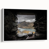 Vintage poster art of a Welsh landscape on a framed canvas, featuring muted earth tones, ideal for living room decor.