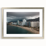 Textured abstract art print of Acapulco scenery in silver frame with mat, featuring vibrant colors, ideal for bedroom art.