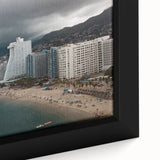Close-up of a textured, extra large framed canvas depicting a colorful Acapulco scenery, ideal for living room decor.