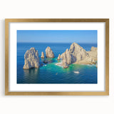 Extra large abstract art print of Cabo San Lucas scenery in gold frame, featuring textured brushstrokes in earthy tones.