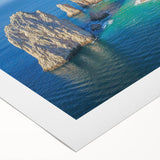 Art deco poster of Cabo San Lucas scenery in muted blue and beige tones on rolled canvas, suitable for dining room wall art.