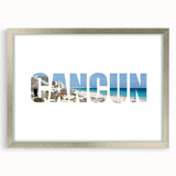 Textured abstract art print of Cancun scenery in silver frame, featuring cool blue and green tones.