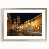 Textured abstract art print of Mexico City in muted earth tones, framed in silver, suitable for bedroom decor.