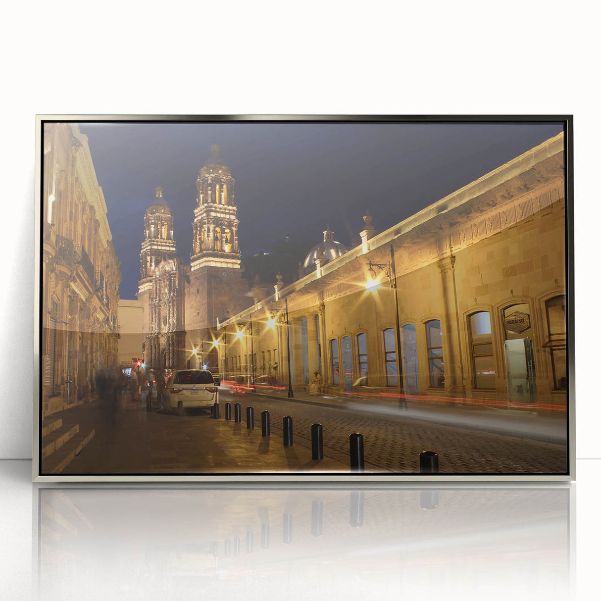 Mid-century modernist art depicting Mexico City scenery in muted tones on a silver-framed acrylic.