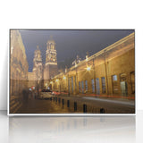 Acrylic print of Mexico City scenery in art deco style with vibrant colors, framed in white.