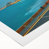 Art deco poster of Tel Aviv skyline in muted gold and blue tones on rolled canvas, suitable for dining room wall art.
