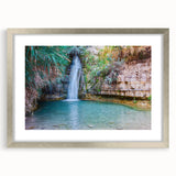 Textured abstract art print depicting Middle Eastern scenery in muted earth tones, framed in silver, ideal for bedroom art.