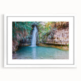 Abstract art print of a Middle Eastern scenery in muted earth tones, framed with a white mat, suitable for dining room decor.