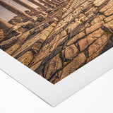 Art deco poster of a Jordanian landscape in muted beige and brown tones on rolled canvas, suitable for dining room decor.