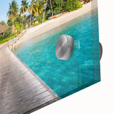 Large abstract oceanic artwork in blue and green tones on acrylic glass.