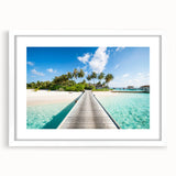 Abstract art print of Tahitian coastline with vibrant blue and green hues on a white framed canvas.
