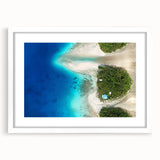 Abstract art print of a serene Micronesian seascape in cool blue and white, framed with a white mat.