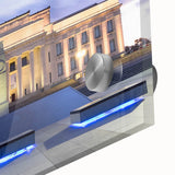 Large abstract wall art depicting Auckland's skyline in muted gray and blue tones on acrylic glass.