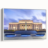 Vintage poster art of Auckland skyline in vibrant colors on a framed canvas, ideal for living room decor.