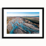Extra large, colorful abstract art print of a textured New Zealand Canterbury scenery on a framed black mat.