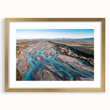 Extra large abstract art print of Canterbury, New Zealand, with textured design in muted earth tones on a gold-framed canvas.