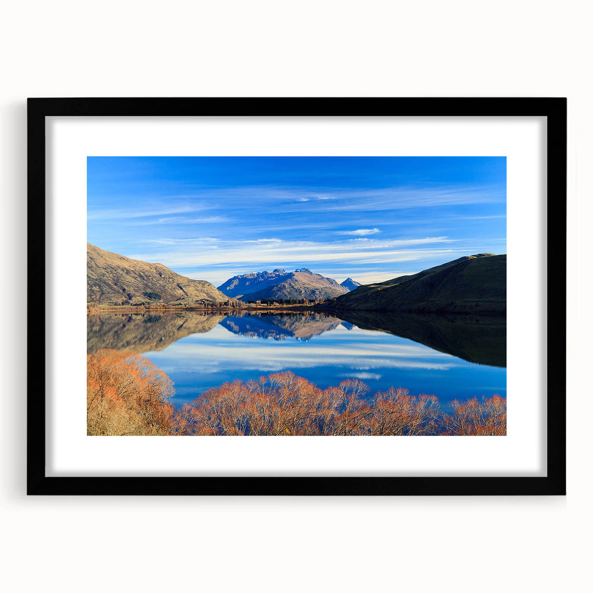 Abstract art print of Otago, New Zealand in vibrant colors on a large canvas, framed in black.
