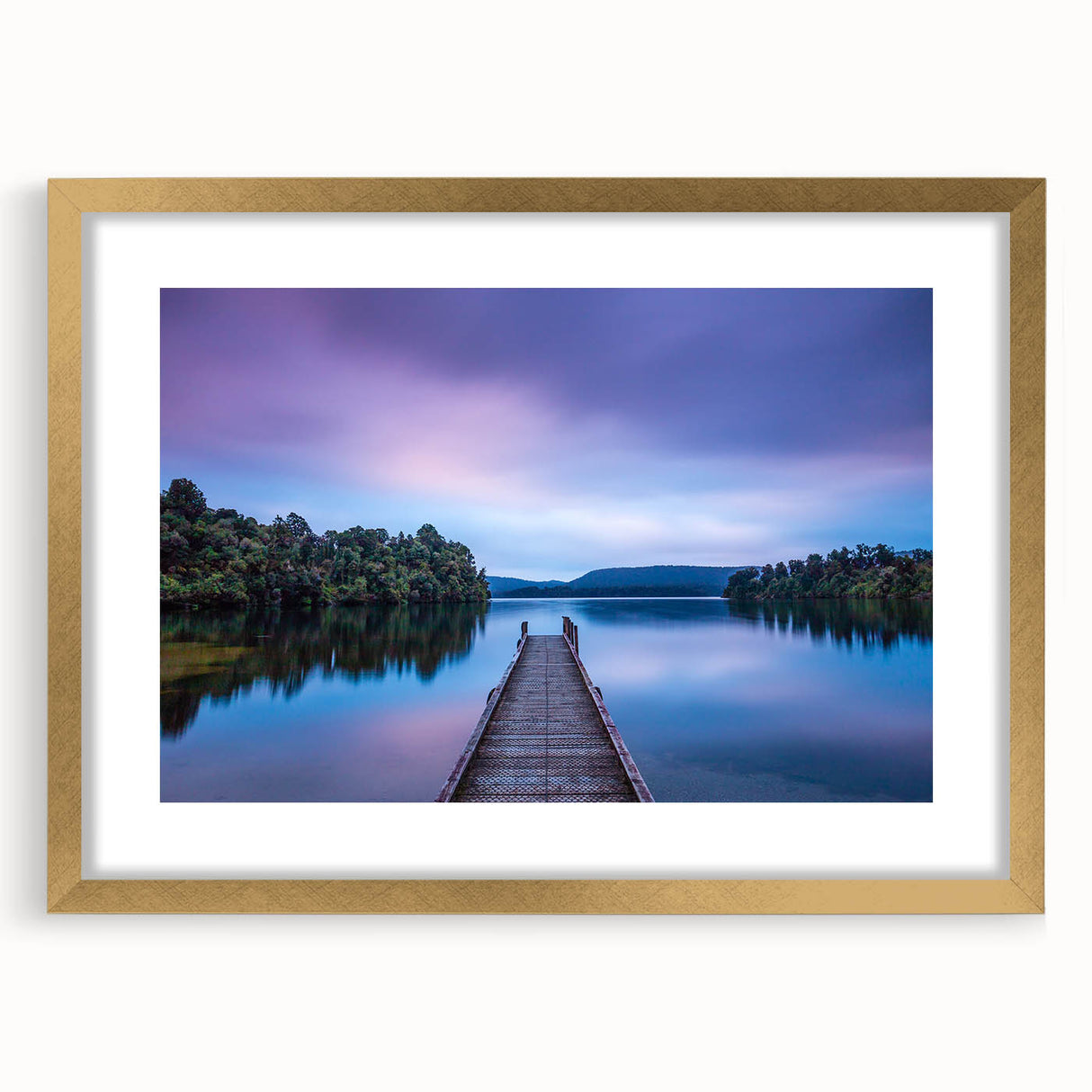 Extra large abstract art print of the New Zealand West Coast in gold frame, featuring textured gray and blue tones.